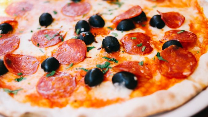 Pizza som näringskälla illustration